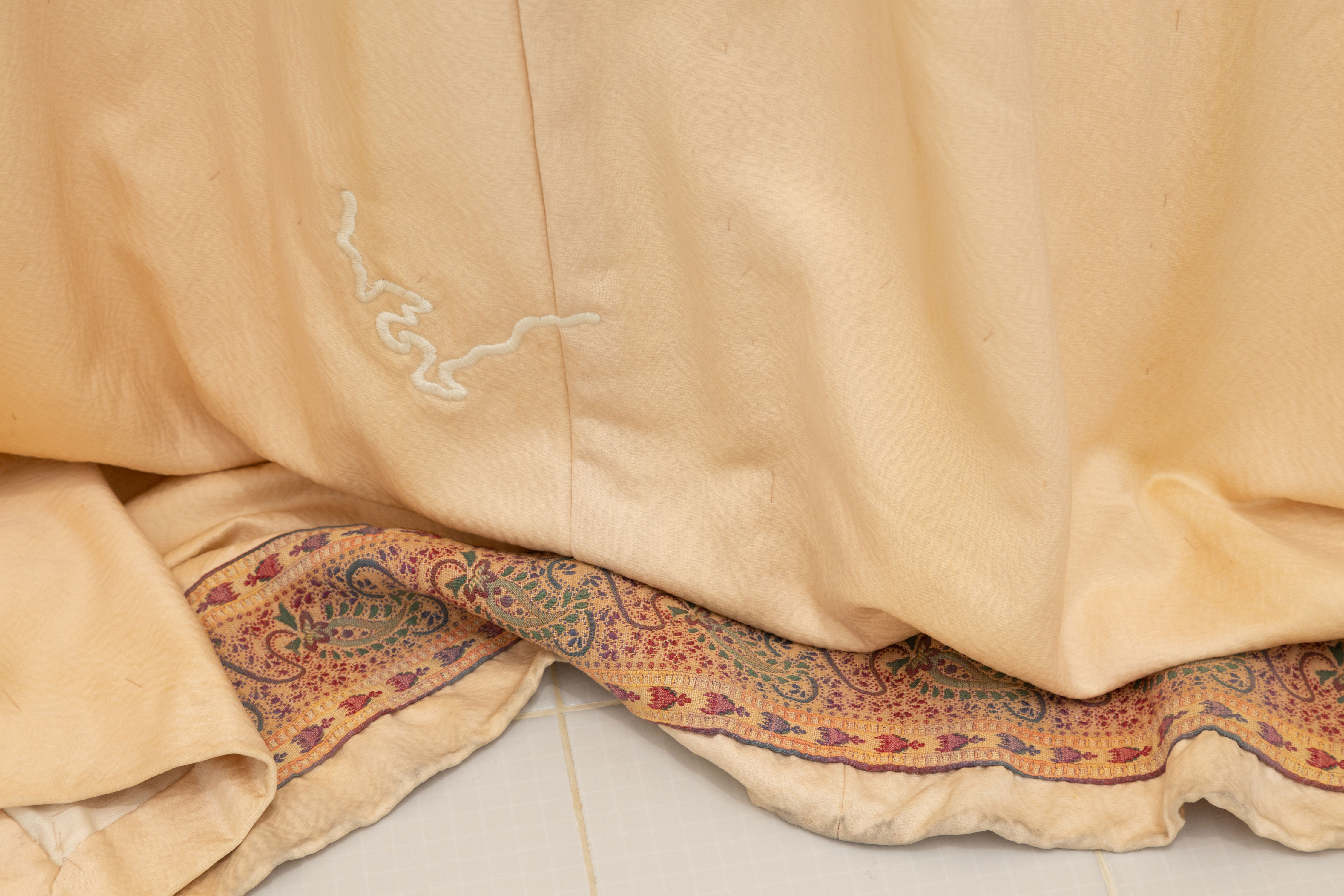 The Encounter of the First and Last Particles of Dust 